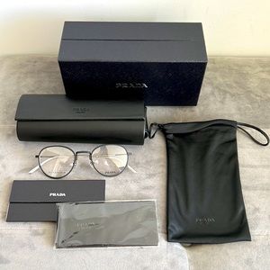 Prada eyewear titanium collection frames unisex. Black/silver